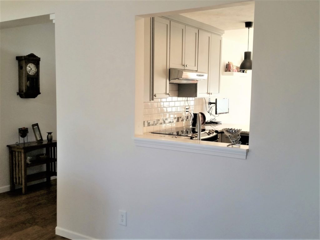 A view of the window going from the family room to the kitchen.