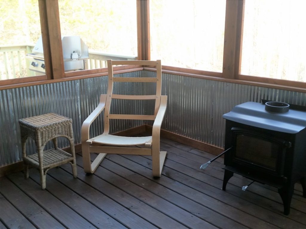 A corner of the inside of the screened-in porch.