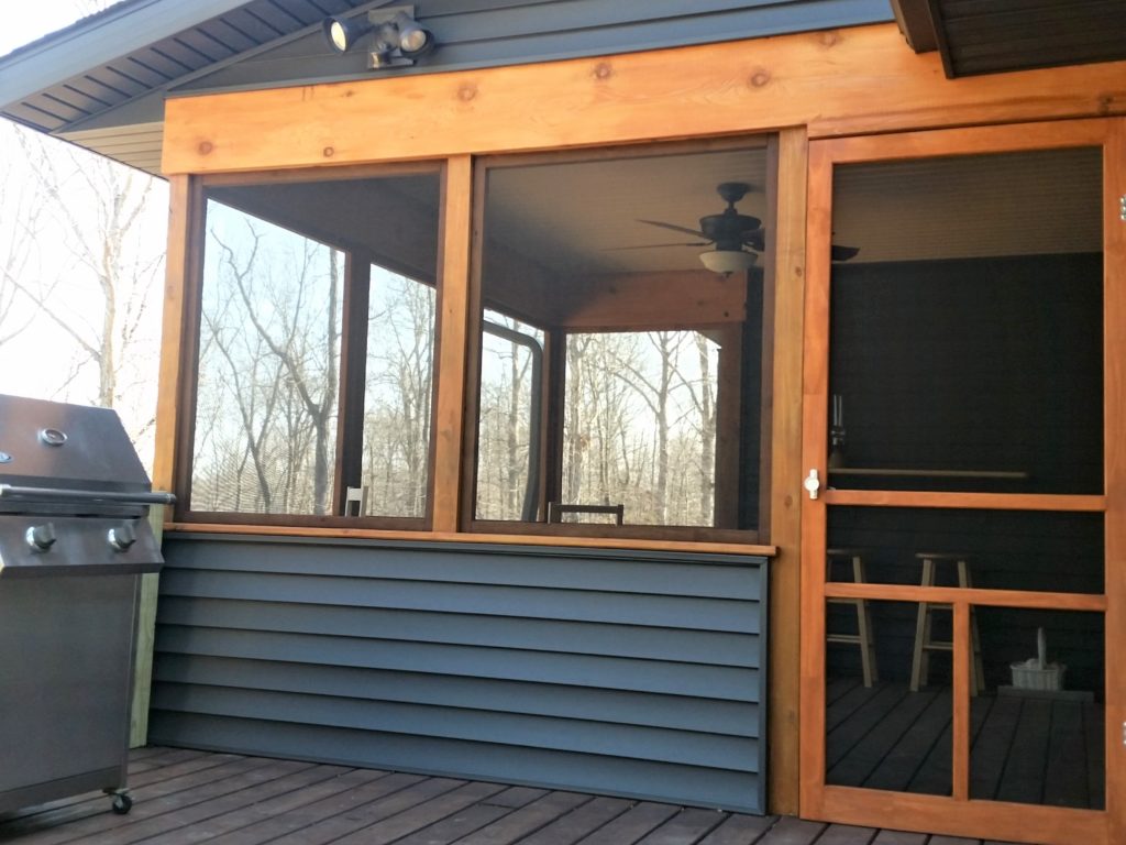 The outside and the door to the screen-in back porch.